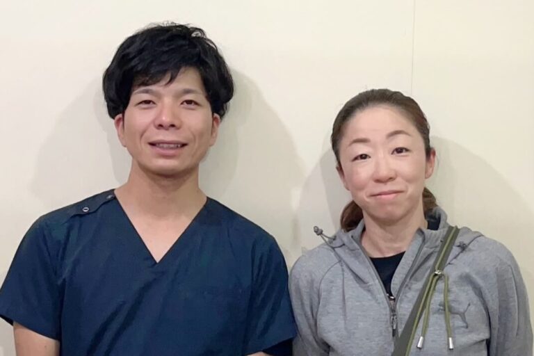 お客さまと並んでいる写真